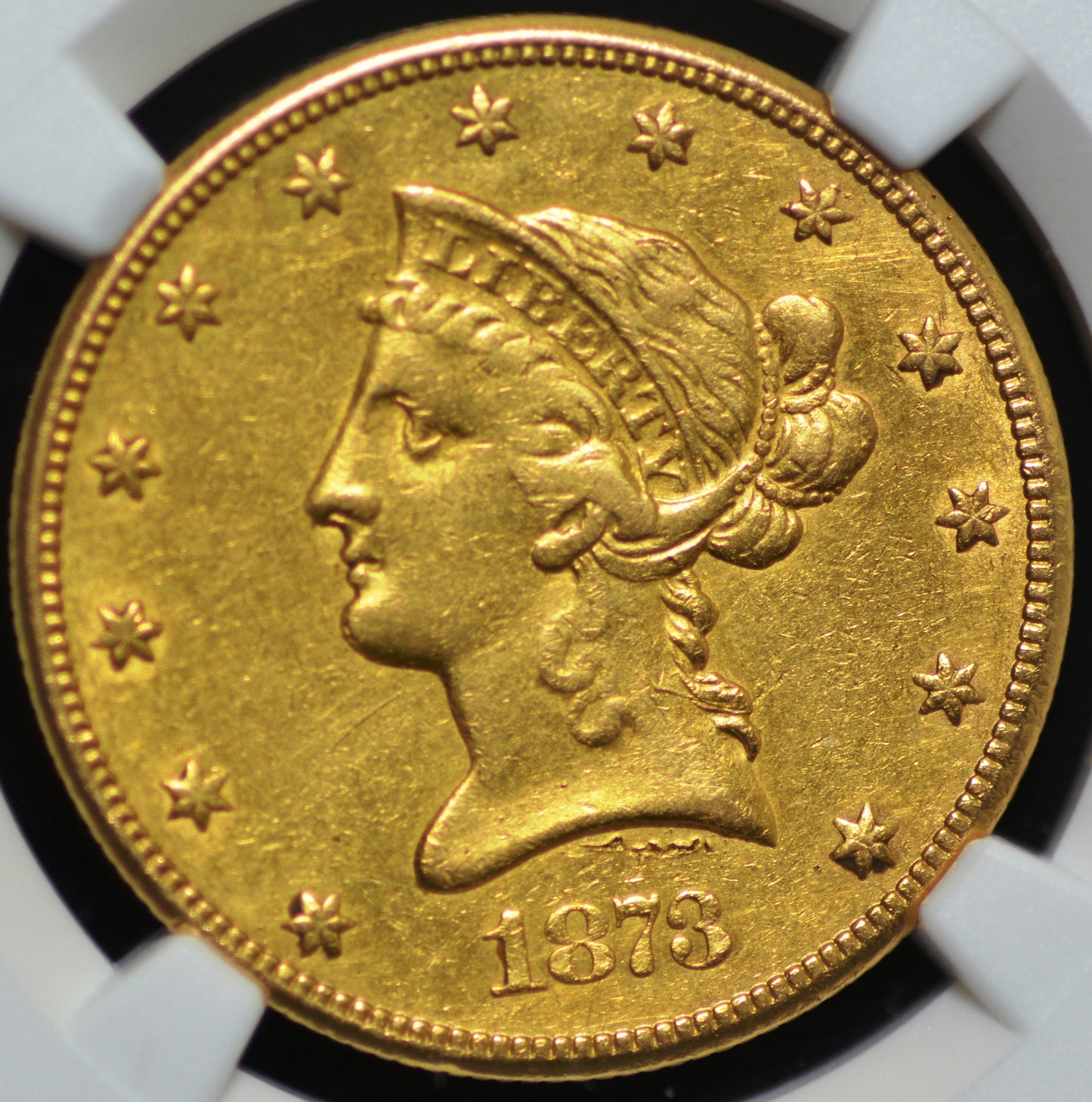 1873-CC $10 Gold Eagle AU Det NGC